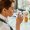 Young businesswoman drinking water while working in the office.